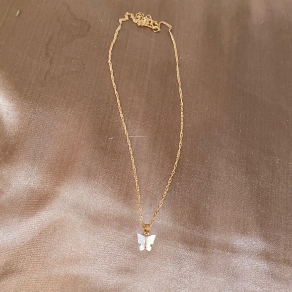 Urban Outfitters Jewelry - White butterfly necklace